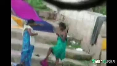 Local guy caught sexy Indian aunts take a bath outdoor in the river. era desi