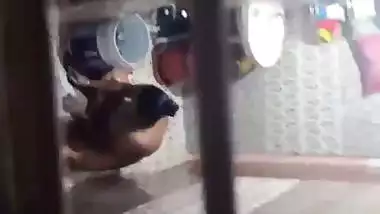 Neighbor aunty taking bath caught by voyeur