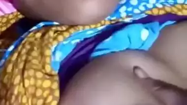 Pretty Desi MILF poses for the camera and teases with big XXX tits