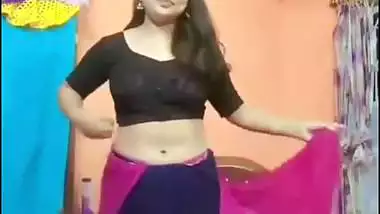 Cute girl stripping saree and showing naked boobs