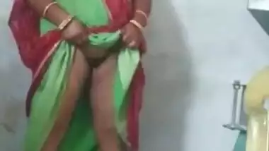 Hubby films his Desi wife when she lifts dress to show XXX pussy