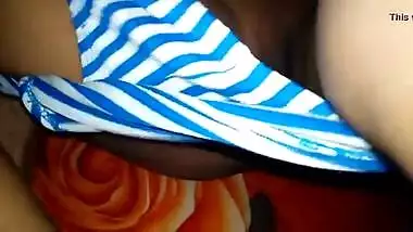 Hot woman takes striped panties off to expose Desi pussy in XXX video